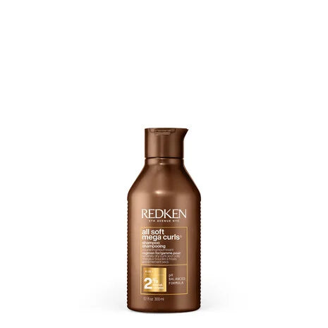 Shampoo Redken All Soft Mega Curls para hidratar, nutrir y definir el cabello rizado