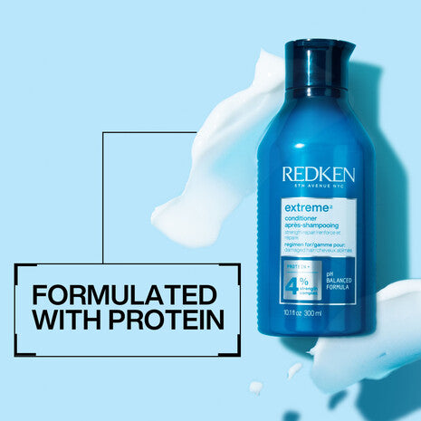 Acondicionador Redken Extreme para cabello dañado con fórmula a base de proteínas, botella y textura del producto